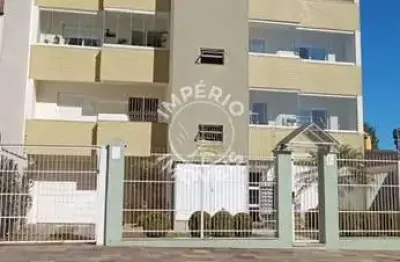 Apartamento semimobiliado - 02 dormitórios, 01 sendo suíte - localizado no bairro kayser.