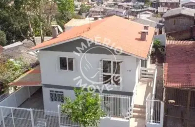 Excelente casa 02 moradias - 05 dormitórios, sendo 01 suíte - localizada no bairro charqueadas.