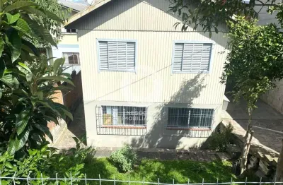 Venda - 02 casas - 6 dormitórios -localizada no bairro rio branco - caxias do sul - rs.