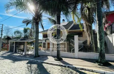 Casa 02 pavimentos semimobiliada - 04 dormitórios, sendo 02 suítes - localizada no Bairro Desvio Rizzo