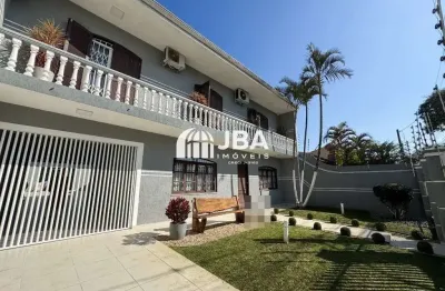 Casa com 5 quartos à venda na rua câmara júnior, 906, jardim das américas, curitiba, 245 m2 por r$ 1.599.000