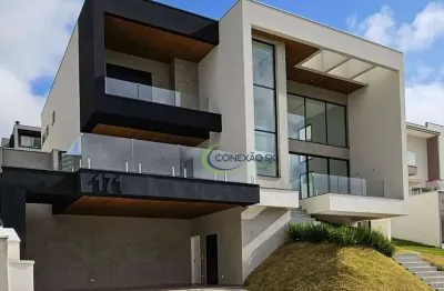 Sobrado com 4 dormitórios à venda, 415 m² por r$ 4.500.000,00 - condomínio reserva do paratehy - são josé dos campos/sp