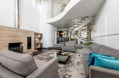 Casa em condomínio fechado com 5 quartos à venda na Avenida General Barreto Viana, 321, Chácara das Pedras, Porto Alegre por R$ 2.299.000