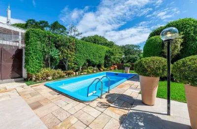 Casa em condomínio fechado com 3 quartos à venda na Rua Sinke, 236, Menino Deus, Porto Alegre por R$ 1.500.000