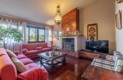 Casa em condomínio fechado com 3 quartos à venda na Rua Senador Annibal Di Primio Beck, 235, Boa Vista, Porto Alegre por R$ 1.180.000