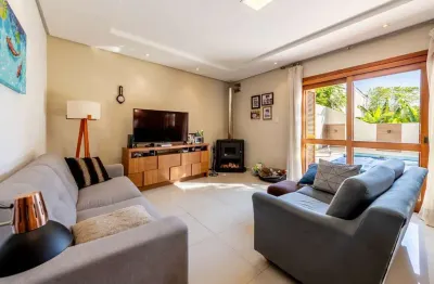 Casa em condomínio fechado com 3 quartos à venda na rua doutor jorge fayet, 636, chácara das pedras, porto alegre por r$ 1.920.000