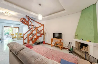 Casa em condomínio fechado com 3 quartos à venda na rua caribe, 42, ipanema, porto alegre por r$ 670.000