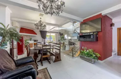 Casa em condomínio fechado com 4 quartos à venda na Avenida General Barreto Viana, 195, Chácara das Pedras, Porto Alegre por R$ 3.800.000