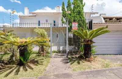 Casa em condomínio fechado com 3 quartos à venda na Rua Luiz Voelcker, 825, Três Figueiras, Porto Alegre por R$ 1.662.500