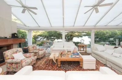 Casa com 4 quartos à venda na avenida coronel marcos, 275, pedra redonda, porto alegre por r$ 10.000.000