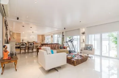 Casa em condomínio fechado com 5 quartos à venda na Rua Attílio Bilibio, 120, Jardim Carvalho, Porto Alegre por R$ 2.300.000