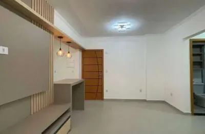 Apartamento com 2 dormitórios à venda, 76 m² por R$ 489.000,00 - Caiçara - Praia Grande/SP