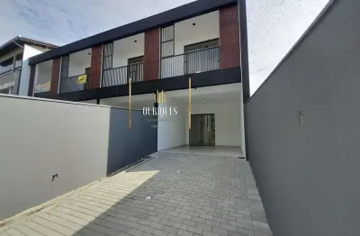 Excelente geminado no iririú com 108m² 3 quartos e um espaço de 14m de fundos