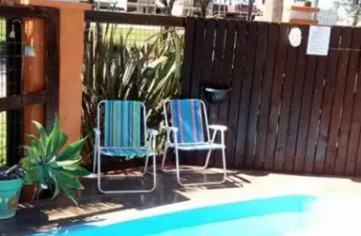 Pousada com 18 apartamentos á poucos metros do mar em imbé