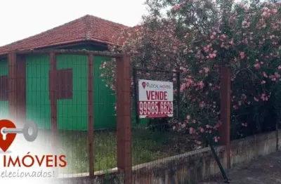 Casa de esquina no centro de tramandaí. aceita permuta