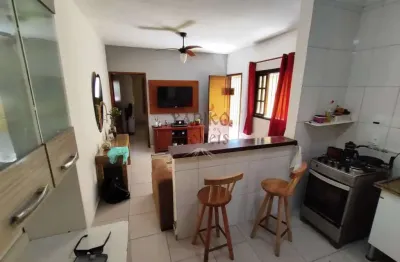 Casa térrea com 02 dorms, quintal, 02 vagas em bertioga.