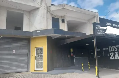 Loja com 110m2 e 2 aptos com com 210 m2 e garagem área total 280m2