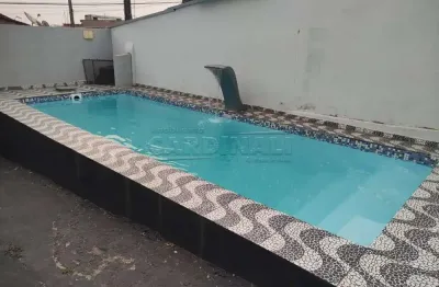 1 dormitório  1sala 1 cozinha 1 banheiro  1 lavanderia  1 piscina  1 área de churrasco