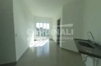 Apartamento de dois dormitórios sendo um suíte com uma vaga de garagem.