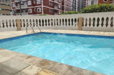 Apartamento na tupi, 2 dormitórios, sacada, piscina, confira na imobiliária em praia grande.