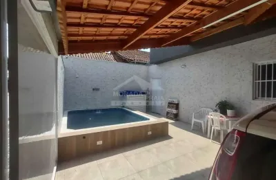 Casa com piscina aquecida e churrasqueira na ocian, praia grande, sp.