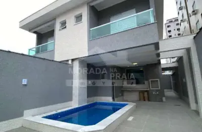 Sobrado geminado na vila tupi, 3 suítes, piscina, sacadas, confira em praia grande.