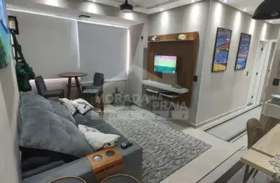 Apartamento mobiliado e decorado no canto do forte, 2 dormitórios, sacada, confira em praia grande.