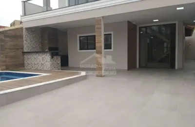 Sobrado isolado de alto padrão no flórida, 3 suítes, 4 vagas, piscina, confira em praia grande.