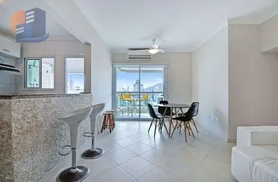 Andar alto com vista para o mar na praia da enseada, com 4 suítes e condomínio clube