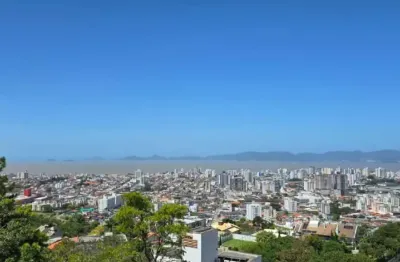 Terreno à venda na Rua das Camélias, S/N, Bosque das Mansões, São José