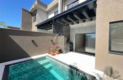 Sobrado com 3 dormitorios com piscina a 350 metros da praia no bairro itauba - barra velha - sc