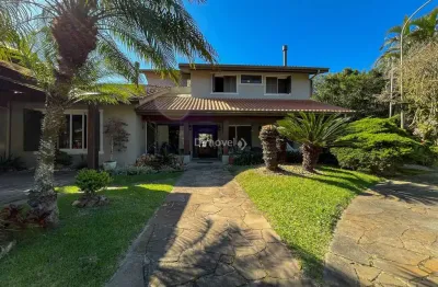 Casa em condomínio fechado com 5 quartos à venda na avenida coronel marcos, 1334, pedra redonda, porto alegre por r$ 2.180.000