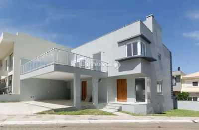 Casa em condomínio fechado com 3 quartos à venda na rua ivo walter kern, 599, hípica, porto alegre por r$ 1.100.000