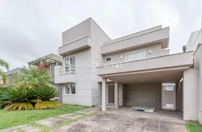 Casa em condomínio fechado com 4 quartos à venda na avenida juca batista, 8000, belém novo, porto alegre por r$ 2.990.000
