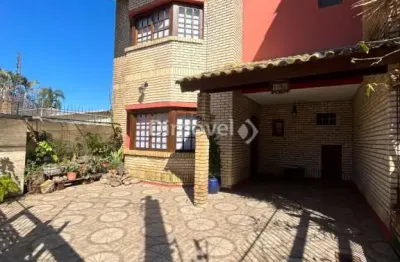 Casa com 3 quartos à venda na rua jacundá, 641, guarujá, porto alegre por r$ 590.000