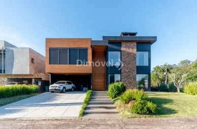 Casa em condomínio fechado com 5 quartos à venda na avenida juca batista, 8000, belém novo, porto alegre por r$ 3.800.000