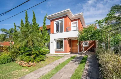 Casa em condomínio fechado com 4 quartos à venda na avenida juca batista, 8000, belém novo, porto alegre por r$ 1.650.000