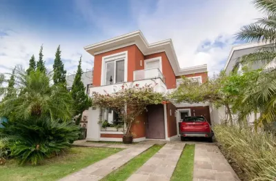 Casa em condomínio fechado com 4 quartos à venda na avenida juca batista, 8000, belém novo, porto alegre por r$ 1.750.000