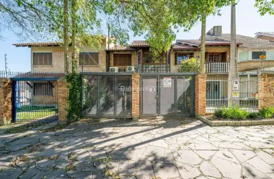 Casa com 3 quartos à venda na avenida copacabana, 336, vila assunção, porto alegre por r$ 889.000
