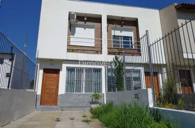 Casa com 2 quartos à venda na rua ilari arlindo basei, 204, guarujá, porto alegre por r$ 420.000