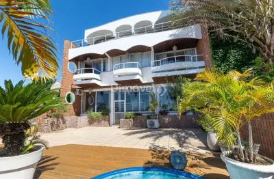 Casa com 4 quartos à venda na rua bororó, 25, vila assunção, porto alegre por r$ 4.240.000