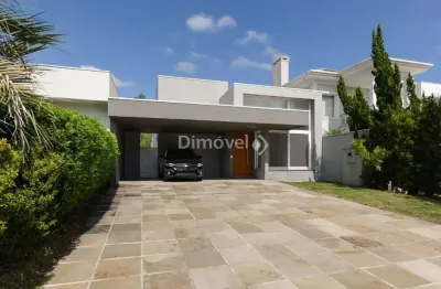 Casa em condomínio fechado com 3 quartos à venda na avenida juca batista, 8000, belém novo, porto alegre por r$ 1.175.000