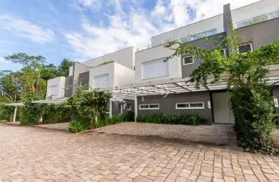 Casa em condomínio fechado com 3 quartos à venda na rua doutor ney de castilhos ferreira, 300, pedra redonda, porto alegre por r$ 2.500.000