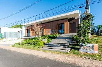 Casa em condomínio fechado com 4 quartos à venda na avenida juca batista, 8000, belém novo, porto alegre por r$ 5.290.000