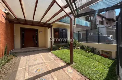 Casa em condomínio fechado com 3 quartos à venda na rua roberto santini, 194, hípica, porto alegre por r$ 650.000