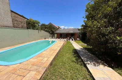 Casa com 6 quartos à venda na rua doutor mário totta, 2114, tristeza, porto alegre por r$ 1.350.000