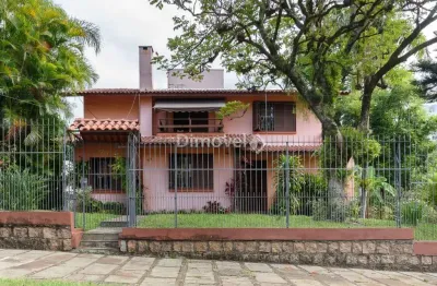 Casa com 6 quartos à venda na rua itapitocaí, 725, cristal, porto alegre por r$ 1.590.000