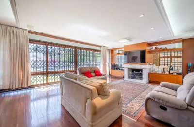 Casa com 4 quartos à venda na avenida pereira passos, 375, vila assunção, porto alegre por r$ 1.590.000