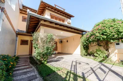Casa com 3 quartos à venda na rua doutor dias de carvalho, 24, tristeza, porto alegre por r$ 1.150.000
