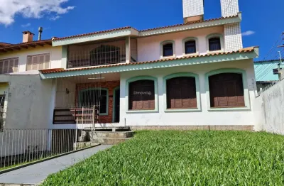 Casa com 4 quartos à venda na rua jaguari, 748, cristal, porto alegre por r$ 760.000